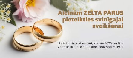 zelta pāri baneris. Attēlā laulības gredzeni un ziedi